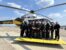 Photo of new hires in front of a STAT MedEvac helicopter